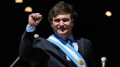Argentina's new president Javier Milei gestures at the crowd from a balcony of Casa Rosada Presidential Palace during his inauguration, in Buenos Aires on December 10, 2023. Libertarian economist Javier Milei was sworn in Sunday as Argentina's president, after a resounding election victory fuelled by fury over the country's economic crisis. (Photo by emiliano lasalvia / AFP)