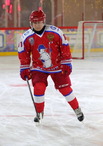 Vladimir Putin took part in the traditional Christmas day ice hockey exhibition match in Red Square and led his side to victory, scoring eight times in an 8-5 victory, according to the Associated Press and Reuters, although the Kremlin match report credit