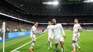 Real Madrid's English midfielder #5 Jude Bellingham celebrates scoring his team's third goal during the Spanish league football match between Real Madrid CF and FC Barcelona at the Santiago Bernabeu stadium in Madrid on April 21, 2024. (Photo by OSCAR DEL POZO / AFP)