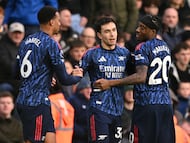 Arsenal's Spanish defender #36 Martin Zubimendi (C) celebrates with Arsenal's Brazilian defender #06 Gabriel Magalhaes (L) and Arsenal's English defender #20 Noni Madueke (R) after scoring the opening goal of the English Premier League football match between Leeds United and Arsenal at Elland Road in Leeds, northern England on January 31, 2026. (Photo by Oli SCARFF / AFP) / RESTRICTED TO EDITORIAL USE. No use with unauthorized audio, video, data, fixture lists, club/league logos or 'live' services. Online in-match use limited to 120 images. An additional 40 images may be used in extra time. No video emulation. Social media in-match use limited to 120 images. An additional 40 images may be used in extra time. No use in betting publications, games or single club/league/player publications. /
