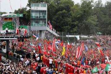 MONZA, ITALY - SEPTEMBER 04: Sebastian Vettel of Germany and Ferrari, Lewis Hamilton of Great Britain and Mercedes GP and Nico Rosberg of Germany and Mercedes GP celebrate on the podium during the Formula One Grand Prix of Italy at Autodromo di Monza on