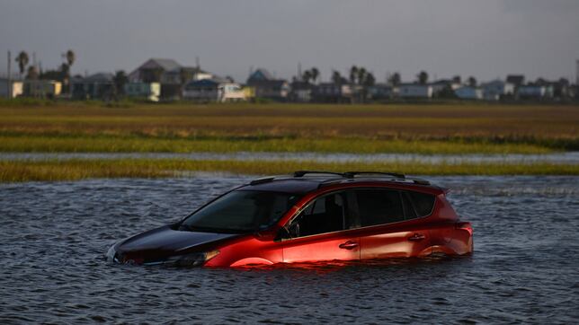 What is a storm surge and how far can it come inland?