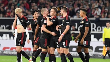 Union Berlin's German defender Paul Jaeckel (C) celebrates scoring the opening goal with his team mates  during the German first division Bundesliga football match VfB Stuttgart v Union Berlin in Stuttgart, southern Germany, on October 9, 2022. - - DFL REGULATIONS PROHIBIT ANY USE OF PHOTOGRAPHS AS IMAGE SEQUENCES AND/OR QUASI-VIDEO (Photo by THOMAS KIENZLE / AFP) / DFL REGULATIONS PROHIBIT ANY USE OF PHOTOGRAPHS AS IMAGE SEQUENCES AND/OR QUASI-VIDEO (Photo by THOMAS KIENZLE/AFP /AFP via Getty Images)