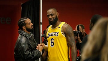 TORONTO, ON - MARCH 18: Drake and LeBron James #6 of the Los Angeles Lakers talk after the NBA game between the Toronto Raptors and the Los Angeles Lakers at Scotiabank Arena on March 18, 2022 in Toronto, Canada. NOTE TO USER: User expressly acknowledges and agrees that, by downloading and or using this Photograph, user is consenting to the terms and conditions of the Getty Images License Agreement. (Photo by Cole Burston/Getty Images)