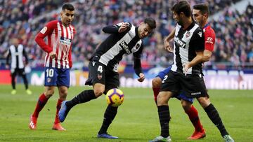 Rober Pier intenta superar a Koke durante el Atlético-Levante.