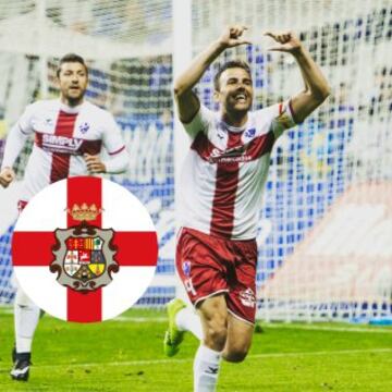 La Sociedad Deportiva Huesca en la Segunda División de España ostenta en su indumentaria alternativa la Cruz de San Jorge a lo largo del pecho. Se debe a que tal indumentaria se basó en el escudo de Aragón que también cuenta con la insignia del santo patrono.