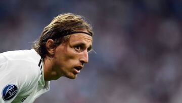 Real Madrid's Croatian midfielder Luka Modric looks on during the UEFA Champions League group G football match between Real Madrid CF and AS Roma at the Santiago Bernabeu stadium in Madrid on September 19, 2018. (Photo by GABRIEL BOUYS / AFP)