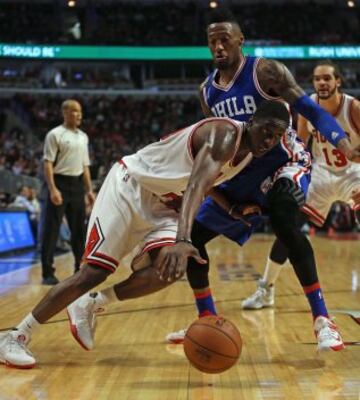 Tony Snell y Robert Covington.