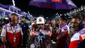 Prima Pramac's Spanish rider Jorge Martin takes his position on the starting grid ahead of the Moto GP Grand Prix of Qatar at the Lusail International Circuit, in the city of Lusail on November 19, 2023. (Photo by KARIM JAAFAR / AFP)