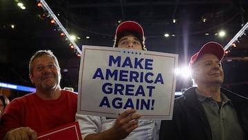 Supporters hold "Make America great again" placards as they attend Republican presidential nominee and former U.S. President Donald Trump's campaign event, in Allentown, Pennsylvania, U.S., October 29, 2024. REUTERS/Brendan McDermid