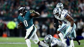 PHILADELPHIA, PENNSYLVANIA - NOVEMBER 05: D'Andre Swift #0 of the Philadelphia Eagles is tackled by Donovan Wilson #6 of the Dallas Cowboys during the second half at Lincoln Financial Field on November 05, 2023 in Philadelphia, Pennsylvania.   Tim Nwachukwu/Getty Images/AFP (Photo by Tim Nwachukwu / GETTY IMAGES NORTH AMERICA / Getty Images via AFP)