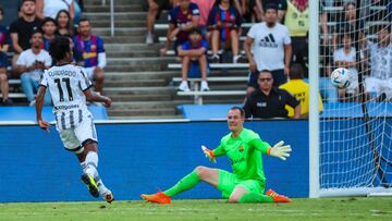 Jul 26, 2022; Dallas, Texas, USA; Juventus midfielder Juan Cuadrado (11) narrowly misses scoring a goal as FC Barcelona goalkeeper Marc-Andre ter Stegen (1) defends during the first half at the Cotton Bowl. Mandatory Credit: Kevin Jairaj-USA TODAY Sports