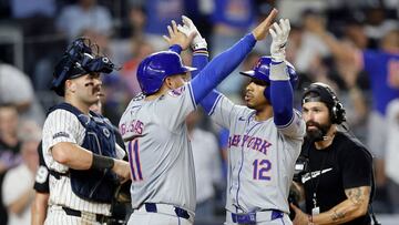 NEW YORK, NEW YORK - JULY 24: Francisco Lindor #12 of the New York Mets celebrates his eighth inning three-run home run against the New York Yankees with teammate Jose Iglesias #11 at Yankee Stadium on July 24, 2024 in New York City. Jim McIsaac/Getty Images/AFP (Photo by Jim McIsaac / GETTY IMAGES NORTH AMERICA / Getty Images via AFP)