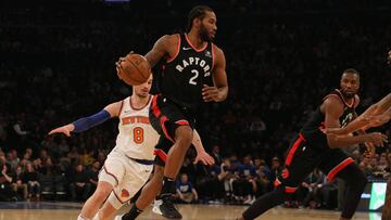 Feb 9, 2019; New York, NY, USA; Toronto Raptors forward Kawhi Leonard (2) controls the ball against New York Knicks forward Mario Hezonja (8) during the first quarter at Madison Square Garden. Mandatory Credit: Brad Penner-USA TODAY Sports