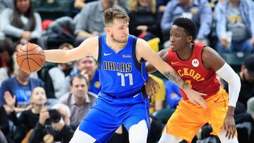 INDIANAPOLIS, IN - JANUARY 19: Luka Doncic #77 of the Dallas Mavericks dribbles the ball while defended by Victor Oladipo #4 of the Indiana Pacers at Bankers Life Fieldhouse on January 19, 2019 in Indianapolis, Indiana. NOTE TO USER: User expressly acknowledges and agrees that, by downloading and or using this photograph, User is consenting to the terms and conditions of the Getty Images License Agreement. Andy Lyons/Getty Images/AFP
== FOR NEWSPAPERS, INTERNET, TELCOS & TELEVISION USE ONLY ==