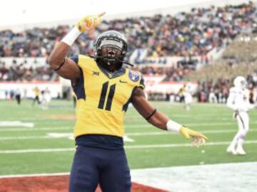 White es un receptor alto, de 1,91 de altura, al que los expertos sitúan como un probable top 10 junto con el otro receptor estrella de este draft, Amari Cooper. En la foto le vemos celebrando un touchdown en la Liberty Bowl frente a Texas A&M.