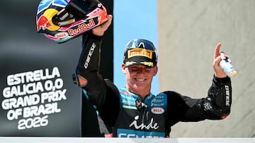 CFMOTO Inde Aspar Team's Spanish rider Daniel Holgado celebrates on the podium after winning the Moto2 Grand Prix of Brazil at the Ayrton Senna International racetrack in Goiania, state of Goias, Brazil, on March 22, 2026. (Photo by EVARISTO SA / AFP)