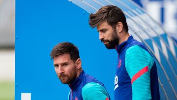 Messi y Piqué, en un entrenamiento con el Barça.