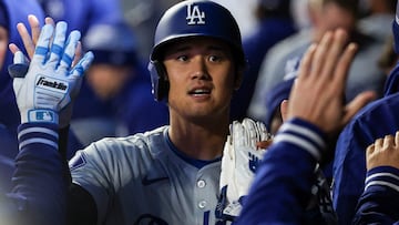 MINNEAPOLIS, MINNESOTA - APRIL 8: Shohei Ohtani #17 of the Los Angeles Dodgers is congratulated after scoring on a single hit by Will Smith #16 during the sixth inning against the Minnesota Twins at Target Field on April 8, 2024 in Minneapolis, Minnesota.   Matt Krohn/Getty Images/AFP (Photo by Matt Krohn / GETTY IMAGES NORTH AMERICA / Getty Images via AFP)