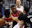 Ni los 41 de Wiggins salvan a los Wolves; John Wall, 18+18