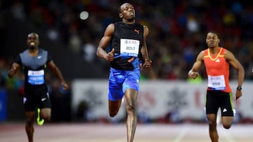 Usain Bolt compite ante Nickel Ashmeade y Warren Weir durante la prueba de 200 metros de la Diamond League Athletics "Weltklasse" en Zúrich.