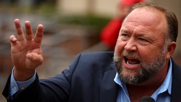 InfoWars reporter Jamie White was found badly beaten outside his home in Austin, Texas and host Alex Jones has laid the blame on the Travis County DA.