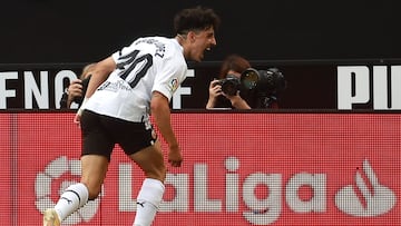 Valencia's Spanish forward Diego Lopez celebrates scoring the opening goal during the Spanish league football match between Valencia CF and Real Madrid CF at the Mestalla stadium in Valencia on May 21, 2023. (Photo by JOSE JORDAN / AFP)