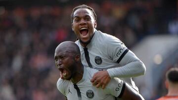 Paris Saint-Germain's Portuguese midfielder Danilo Pereira (L) celebrates with Paris Saint-Germain's Portuguese midfielder Renato Sanches (R) after scoring their team's second goal during the French L1 football match between FC Lorient and Paris Saint Germain (PSG) at Stade du Moustoir in Lorient, western France on November 6, 2022. (Photo by JEAN-FRANCOIS MONIER / AFP) (Photo by JEAN-FRANCOIS MONIER/AFP via Getty Images)