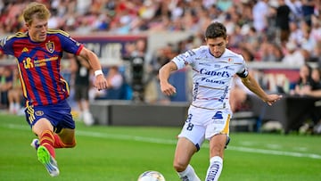 Aug 2, 2025; Sandy, UT, USA; Atletico de San Luis midfielder Juan Manuel Sanabria (8) makes cross pass around Real Salt Lake defender Bode Hidalgo (19) during the first half at America First Field. Mandatory Credit: Peter Creveling-Imagn Images