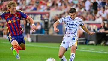 Aug 2, 2025; Sandy, UT, USA; Atletico de San Luis midfielder Juan Manuel Sanabria (8) makes cross pass around Real Salt Lake defender Bode Hidalgo (19) during the first half at America First Field. Mandatory Credit: Peter Creveling-Imagn Images