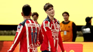 Guadalajara's forward #34 Armando Gonzalez (R) celebrates scoring his team's first goal during the Liga MX Clausura tournament football match between Guadalajara and America at the Akron Stadium in Zapopan, Jalico state, Mexico on February 14, 2026. (Photo by Ulises Ruiz / AFP)