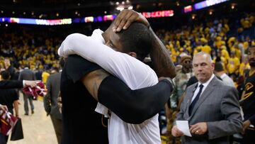 OAKLAND, CA - JUNE 13: LeBron James #23 of the Cleveland Cavaliers hugs teammate Kyrie Irving #2 after defeating the Golden State Warriors in Game 5 of the 2016 NBA Finals with a score of 112 to 97 at ORACLE Arena on June 13, 2016 in Oakland, California. NOTE TO USER: User expressly acknowledges and agrees that, by downloading and or using this photograph, User is consenting to the terms and conditions of the Getty Images License Agreement. Ezra Shaw/Getty Images/AFP
== FOR NEWSPAPERS, INTERNET, TELCOS & TELEVISION USE ONLY ==