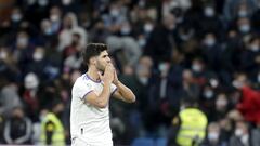 Marco Asensio celebrates after scoring Real Madrid&#039;s winning goal against Granada in LaLiga on Sunday.
 