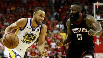 HOUSTON, TX - MAY 28: Stephen Curry #30 of the Golden State Warriors drives against James Harden #13 of the Houston Rockets in the second half of Game Seven of the Western Conference Finals of the 2018 NBA Playoffs at Toyota Center on May 28, 2018 in Hous