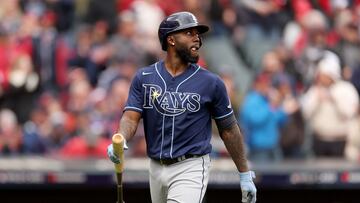 Randy Arozarena, #56 of the Tampa Bay Rays, walks back to the dugout