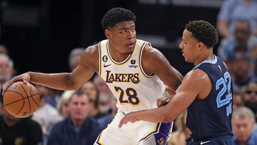 MEMPHIS, TENNESSEE - APRIL 16: Rui Hachimura #28 of the Los Angeles Lakers handles the ball during the second half against Desmond Bane #22 of the Memphis Grizzlies during Game One of the Western Conference First Round Playoffs at FedExForum on April 16, 2023 in Memphis, Tennessee. NOTE TO USER: User expressly acknowledges and agrees that, by downloading and or using this photograph, User is consenting to the terms and conditions of the Getty Images License Agreement. Justin Ford/Getty Images/AFP (Photo by Justin Ford / GETTY IMAGES NORTH AMERICA / Getty Images via AFP)