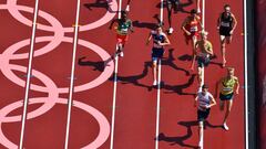 (From L) An overview shows Ethiopia&#039;s Teddese Lemi, Norway&#039;s Jakob Ingebrigtsen, Spain&#039;s Adel Mechaal, Germany&#039;s Robert Farken, Britain&#039;s Jake Heyward, New Zealand&#039;s Nick Willis and Australia&#039;s Stewart McSweyn as they compete in  the men&#039;s 1500m heats during the Tokyo 2020 Olympic Games at the Olympic Stadium in Tokyo on August 3, 2021. (Photo by Antonin THUILLIER / AFP)