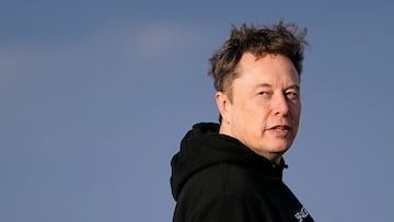Tesla CEO Elon Musk walks to board Air Force One with U.S. President Donald Trump (not pictured) as they depart for Philadelphia, Pennsylvania, from Morristown Municipal Airport in Morristown, New Jersey, U.S., March 22, 2025. REUTERS/Nathan Howard