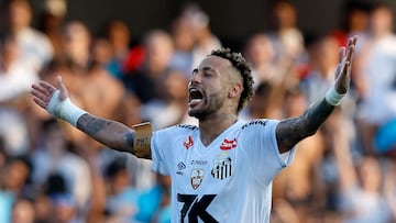 Santos' forward #10 Neymar celebrates at the end of the Brasileirao Serie A football match between Santos and Cruzeiro at the Urbano Caldeira Stadium in Santos, Sao Paulo state, Brazil on December 7, 2025. (Photo by Miguel Schincariol / AFP)