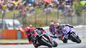 Aprilia rider Aleix Espargaro (L) and Ducati Pramac rider Jorge Martin compete during the Moto Grand Prix de Catalunya at the Circuit de Catalunya on June 5, 2022.