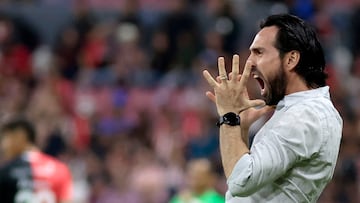 Guadalajara coach Gerardo Espinoza shouts instructions to his players from the touchline during the Liga MX Clausura tournament football match between Atlas and Guadalajara at the Jalisco Stadium in Guadalajara, Jalisco state, Mexico on April 19, 2025. (Photo by ULISES RUIZ / AFP)