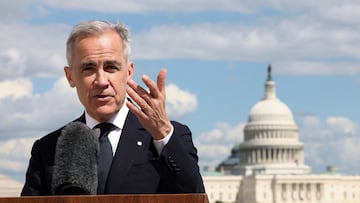 With the U.S. Capitol in the background, Canadian Prime Minister Mark Carney speaks to reporters after his meeting with U.S. President Donald Trump, during a press conference at the Canadian Embassy in Washington, D.C., U.S., May 6, 2025. REUTERS/Kevin Lamarque TPX IMAGES OF THE DAY