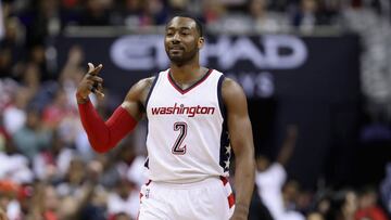 WASHINGTON, DC - APRIL 16: John Wall #2 of the Washington Wizards celebrates after scoring in the second half of the Wizards 114-107 win over the Atlanta Hawks in Game One of the Eastern Conference Quarterfinals during the 2017 NBA Playoffs at Verizon Center on April 16, 2017 in Washington, DC. NOTE TO USER: User expressly acknowledges and agrees that, by downloading and or using this photograph, User is consenting to the terms and conditions of the Getty Images License Agreement.   Rob Carr/Getty Images/AFP
 == FOR NEWSPAPERS, INTERNET, TELCOS &amp; TELEVISION USE ONLY ==