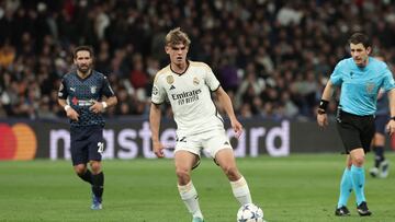 Real Madrid's Argentinian midfielder #32 Nico Paz controls the ball during the UEFA Champions League group C football match between Real Madrid CF and SC Braga at the Santiago Bernabeu stadium in Madrid on November 8, 2023. (Photo by Thomas COEX / AFP)