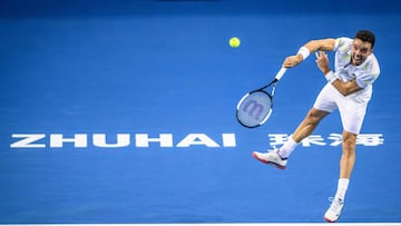 Roberto Bautista Agut of Spain hits a return against  Andreas Seppi of Italy during their men&#039;s singles quarter-final match at the Zhuhai Championships tennis tournament in Zhuhai in China&#039;s southern Guangdong province on September 27, 2019. (Photo by STR / AFP) / China OUT