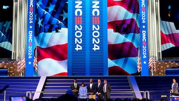 Mayor of Chicago Brandon Johnson, Chair of the Democratic National Convention Committee Minyon Moore, Chair of the Democratic National Committee Jaime Harrison, Executive Director of the Democratic National Convention Committee Alex Hornbrook, and CEO for the United Center Terry Savarise attend the reveal of the podium in advance of the Democratic National Convention (DNC) at the United Center in Chicago, Illinois, U.S. August 15, 2024 REUTERS/Vincent Alban