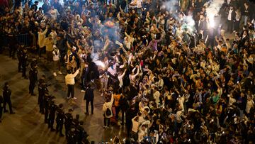 A Manchester City fan wandered through the Real Madrid travelling support.