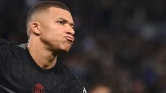 Paris Saint-Germain&#039;s French forward Kylian Mbappe celebrates after scoring a penalty during the French L1 football match between Paris Saint-Germain (PSG) and SCO Angers at the Parc des Princes stadium in Paris on October 15, 2021. (Photo by FRANCK 