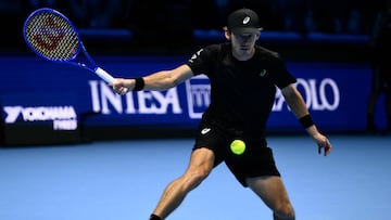Australia's Alex De Minaur hits the ball during his match against USA's Taylor Fritz at the ATP Finals tennis tournament in Turin on November 13, 2025. (Photo by Marco BERTORELLO / AFP)