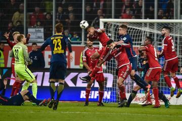 Ingolstadt's French defender Marcel Tisserand heads clear to keep Leipzig out.